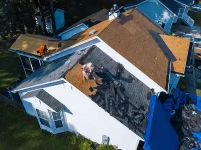 Residential roof getting a shingle replacement